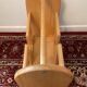 Vintage magazine rack in blond wood