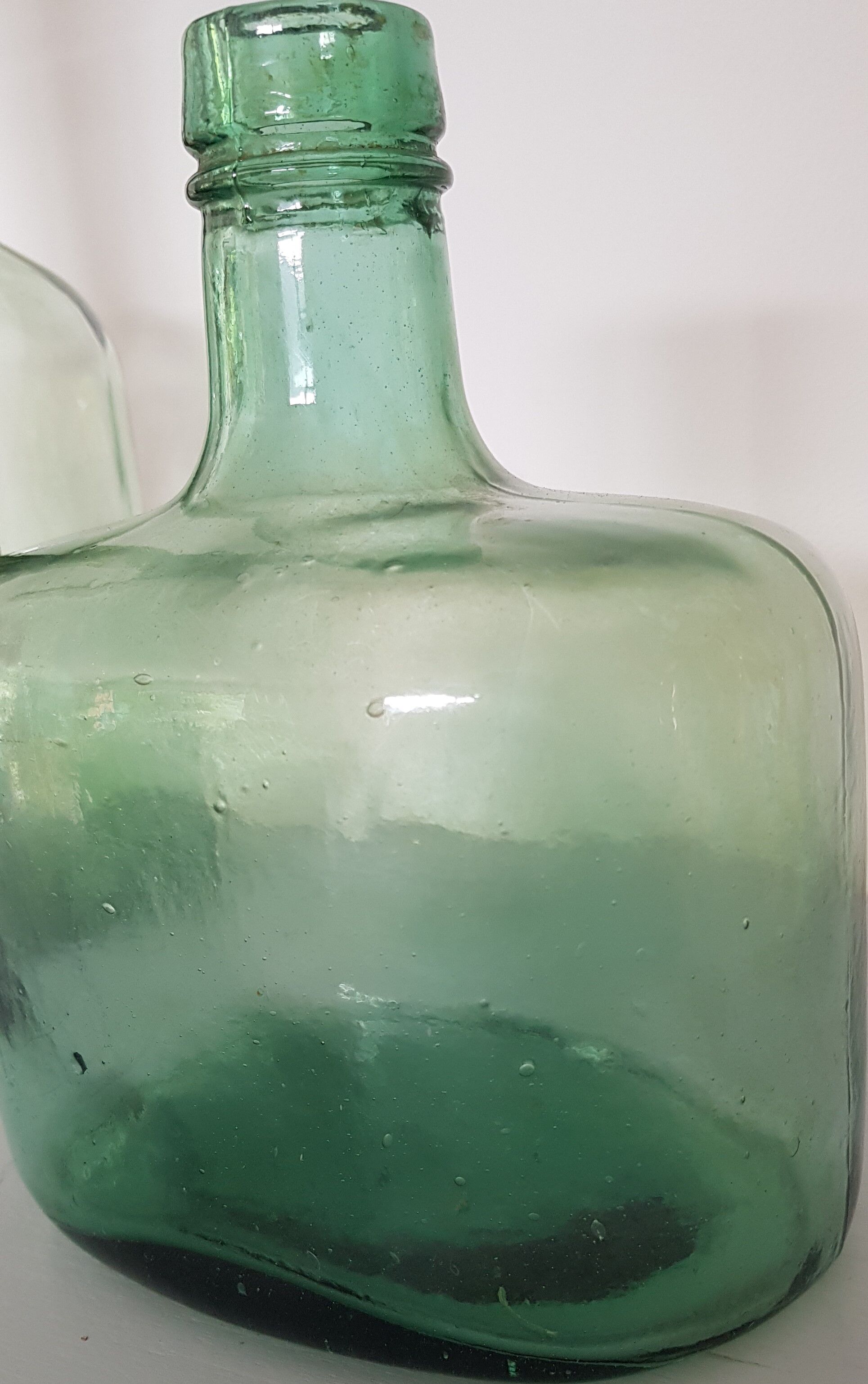 Bluish green bottle