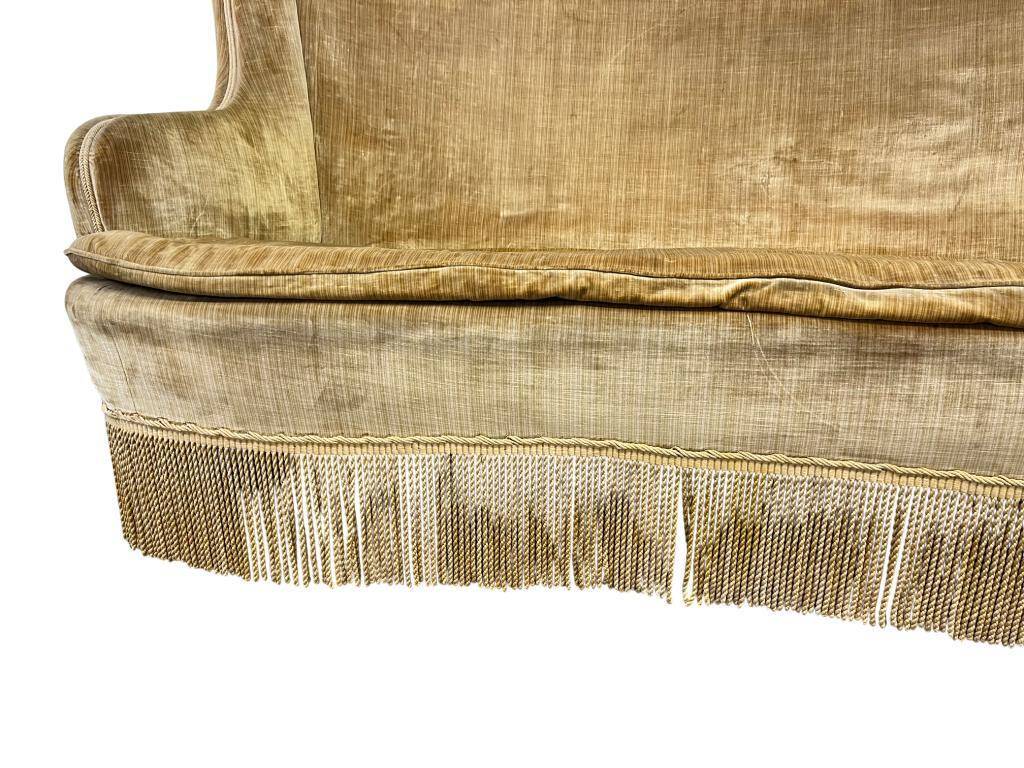 Vintage mustard yellow two-seater sofa with fringe
