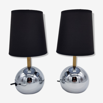 Pair of chrome ball foot bedside lamps and brushed brass of black fabric