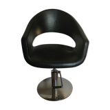 Professional vintage chair sitting in leather and chrome feet adjustable