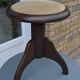 Rotating piano stool