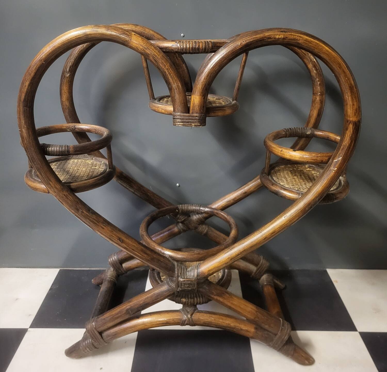 Authentic vintage wicker rattan plant stand planter.