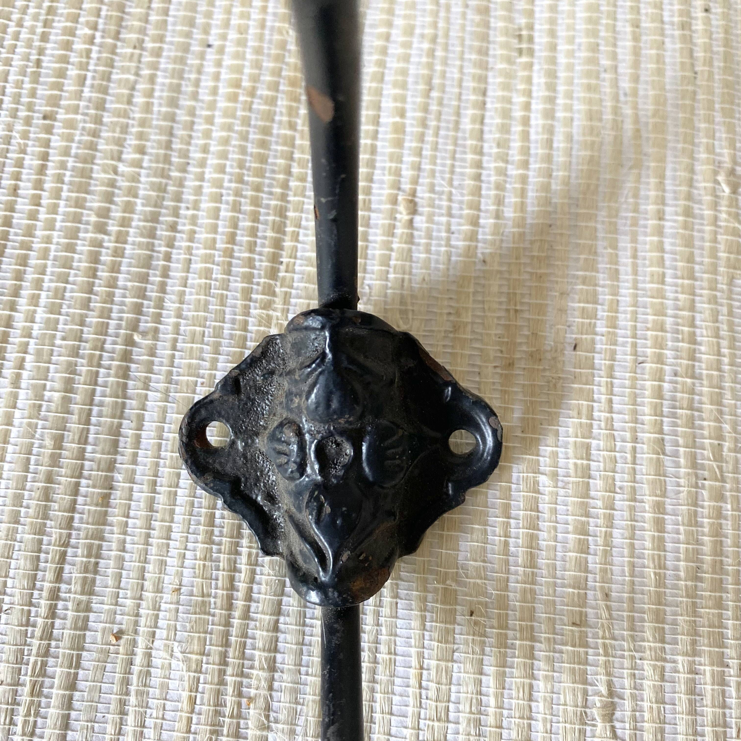 Metal and flowered ceramic coat hooks