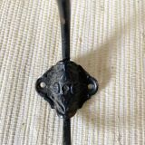 Metal and flowered ceramic coat hooks