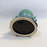 Praticality black and green vase numbered 666