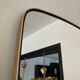 Asymmetrical free-form mirror from the 60s-70s