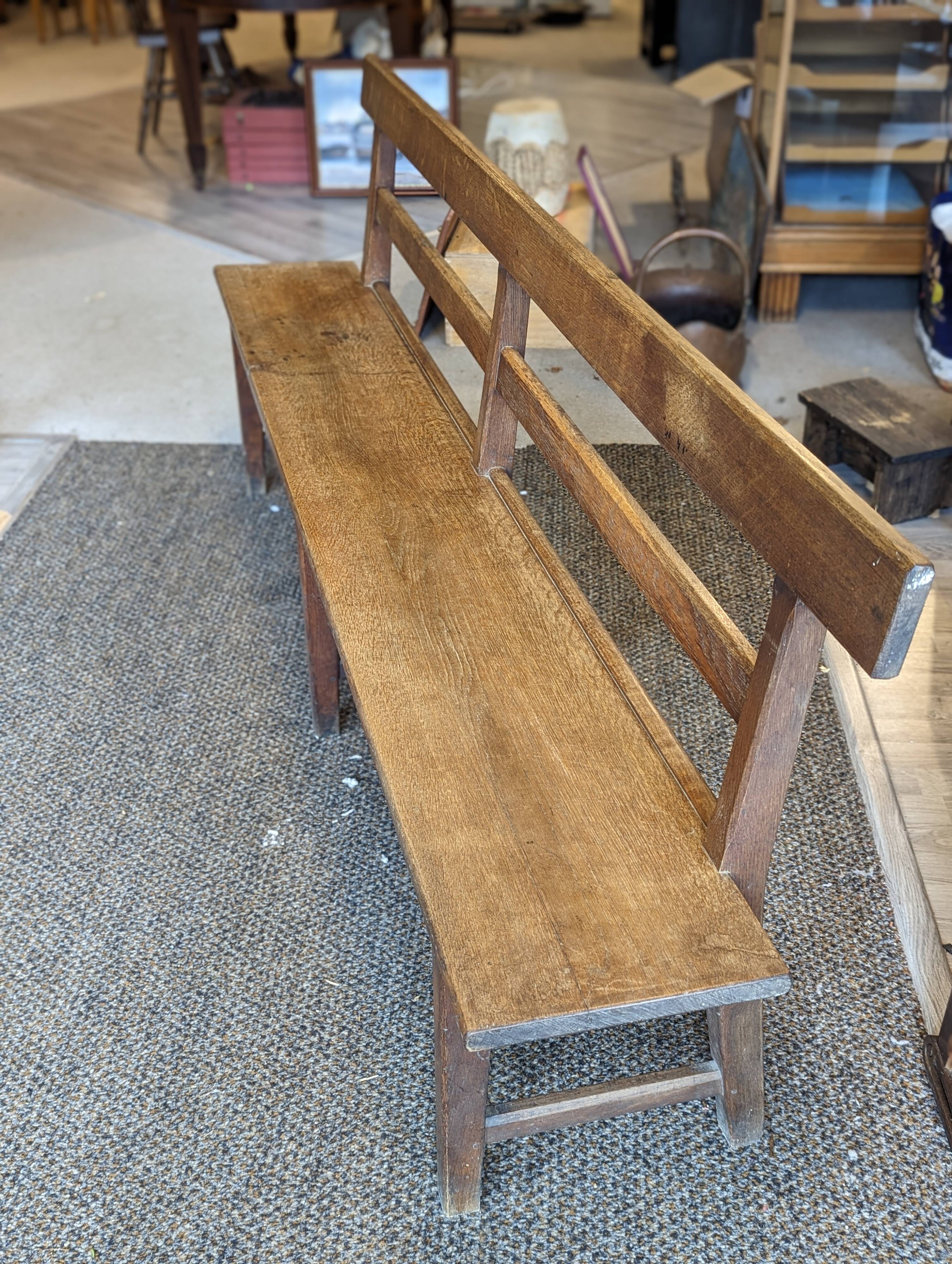 Large oak bench with back