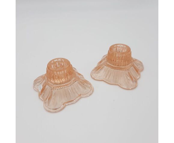Pair of pink candle holders