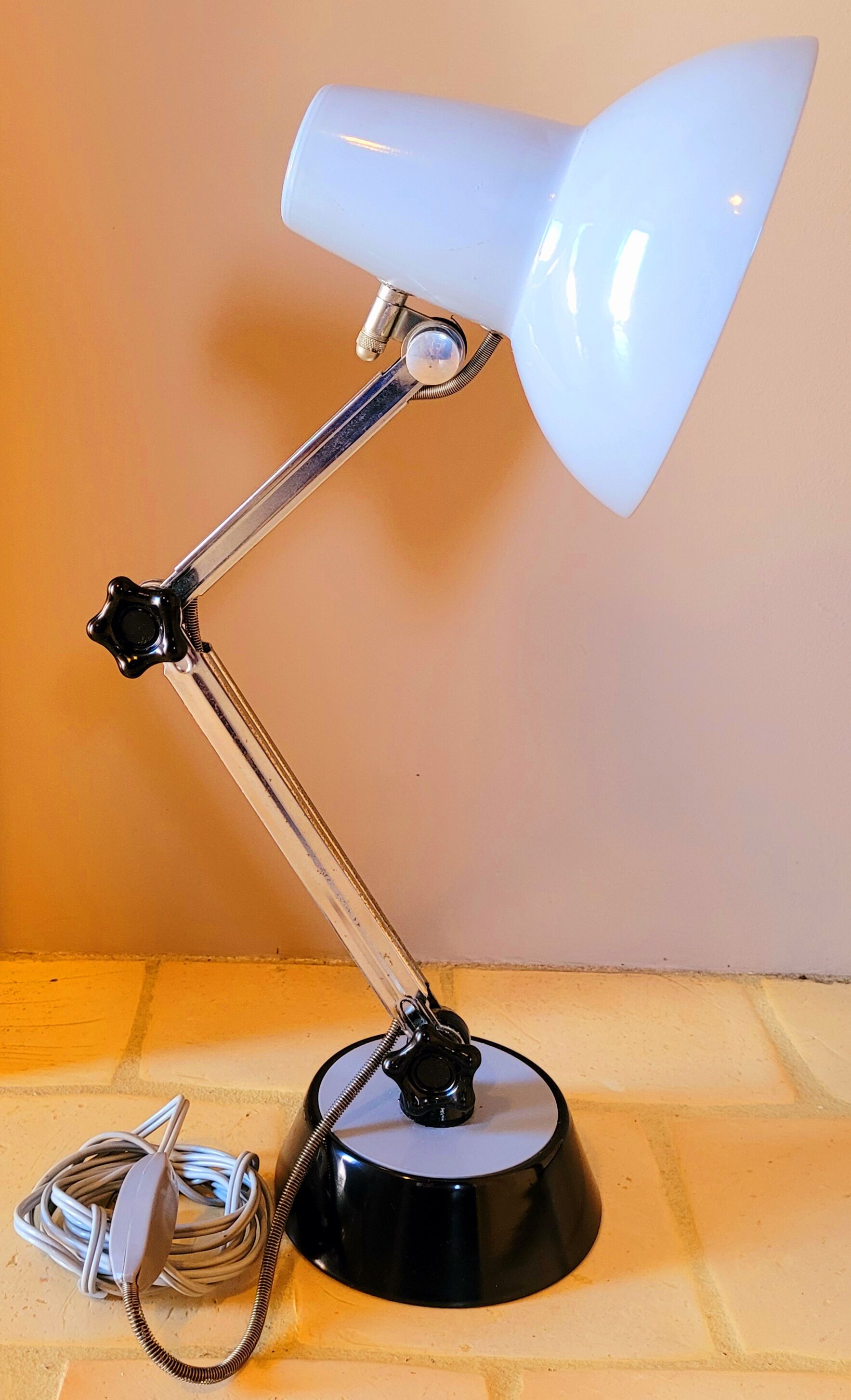Old gray vintage articulated lamp from the 60s