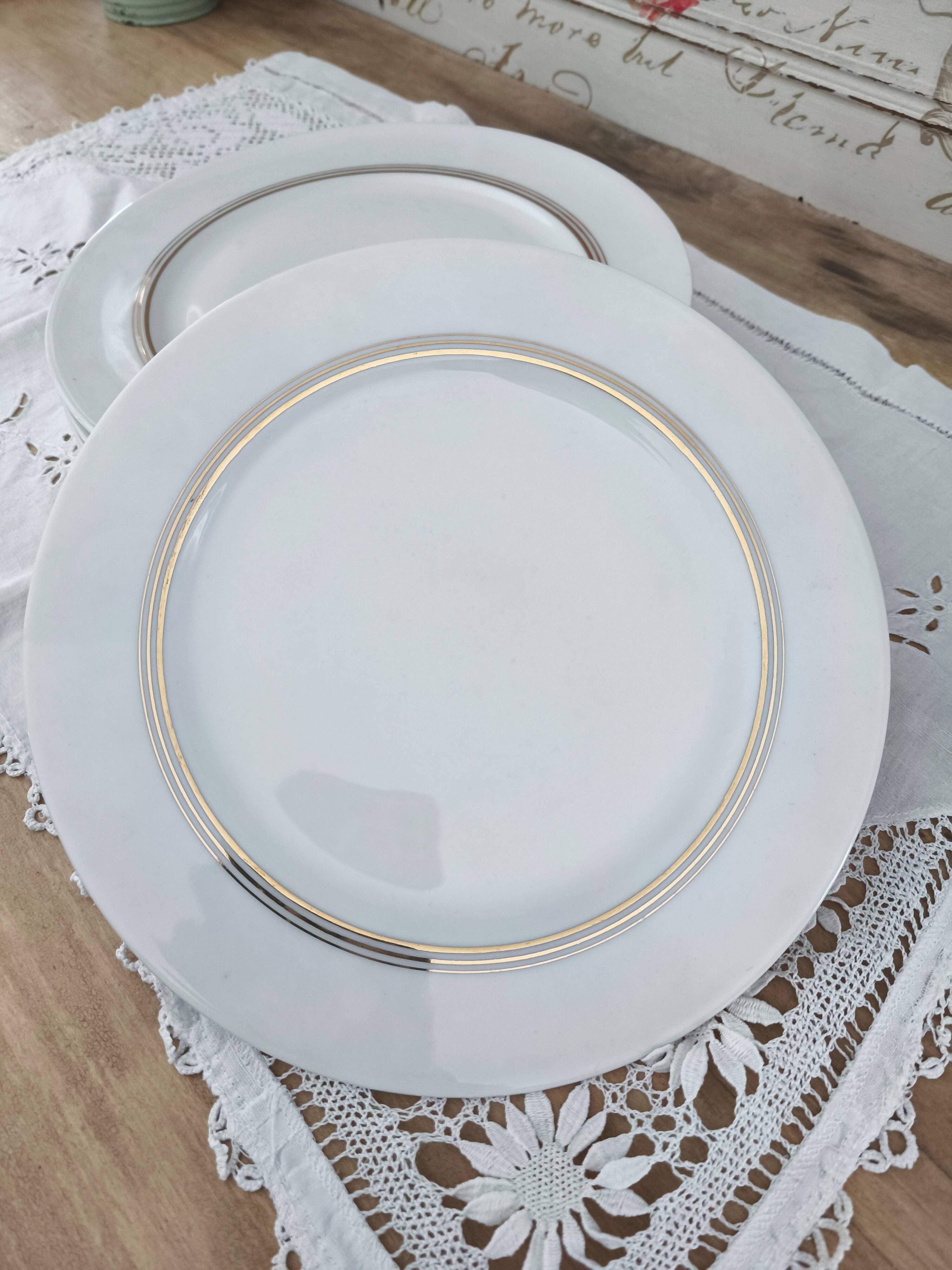 Set of 7 Limoges porcelain dinner plates from Maison Charles Ahrenfeldt