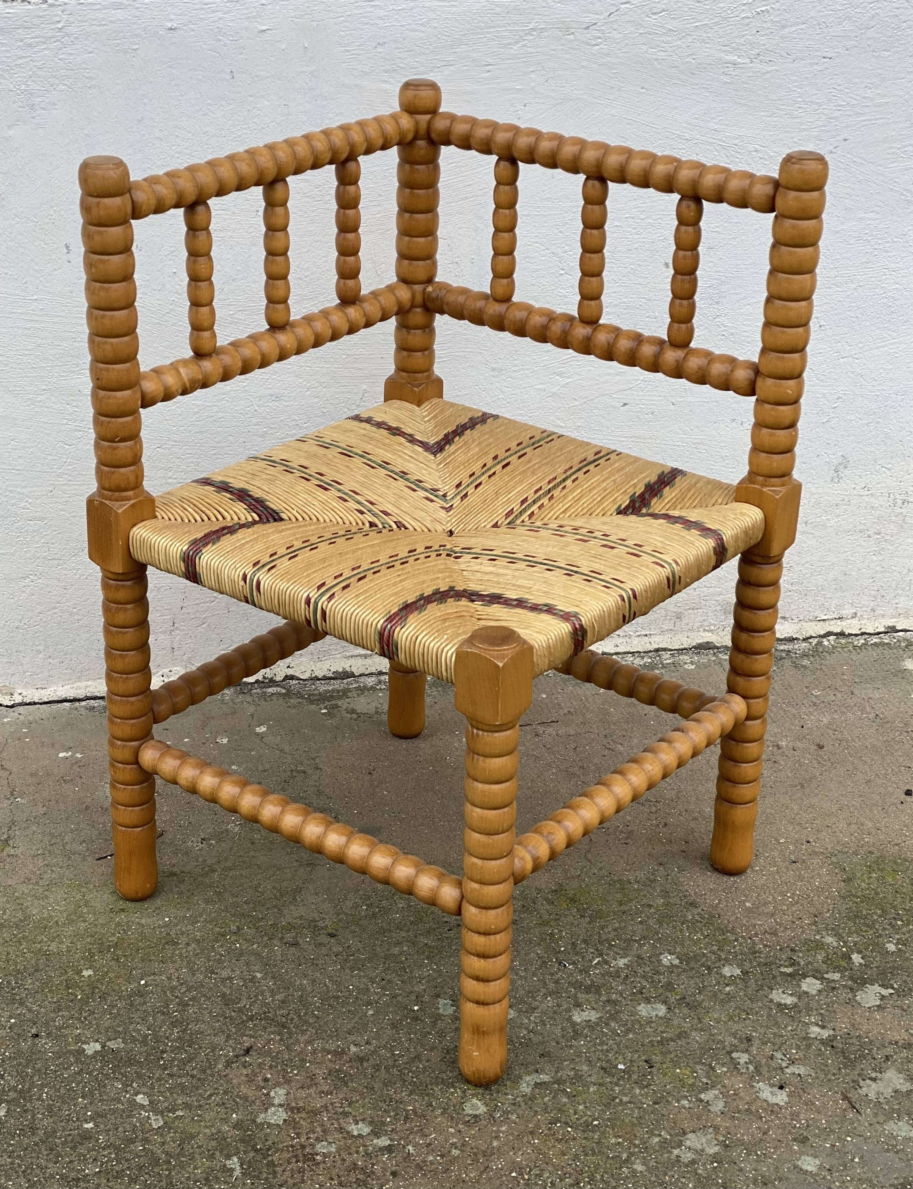 Art Deco turned wood straw corner armchair