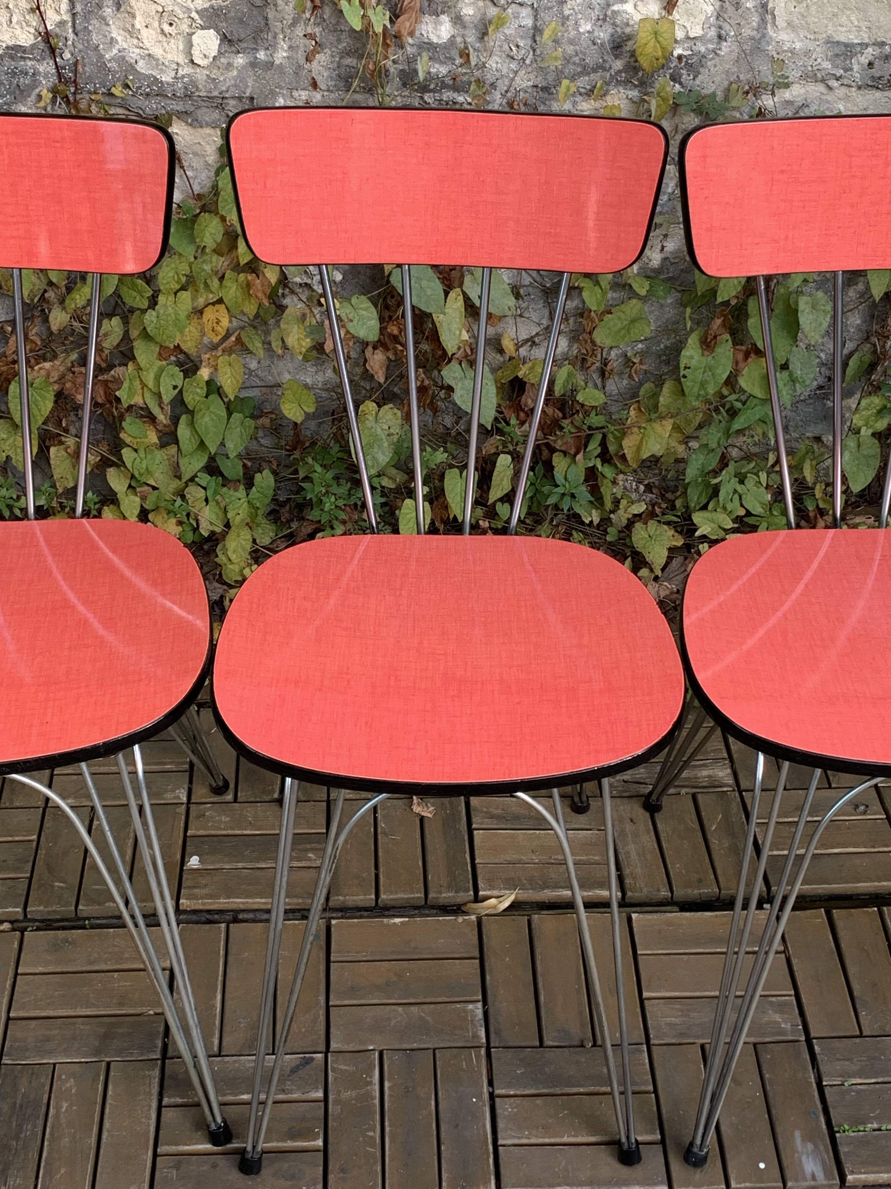 4 red Formica chairs with Eiffel legs, 1950s