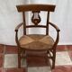 Light wood armchair seated in vintage straw dimension: height -78cm- width -54cm-