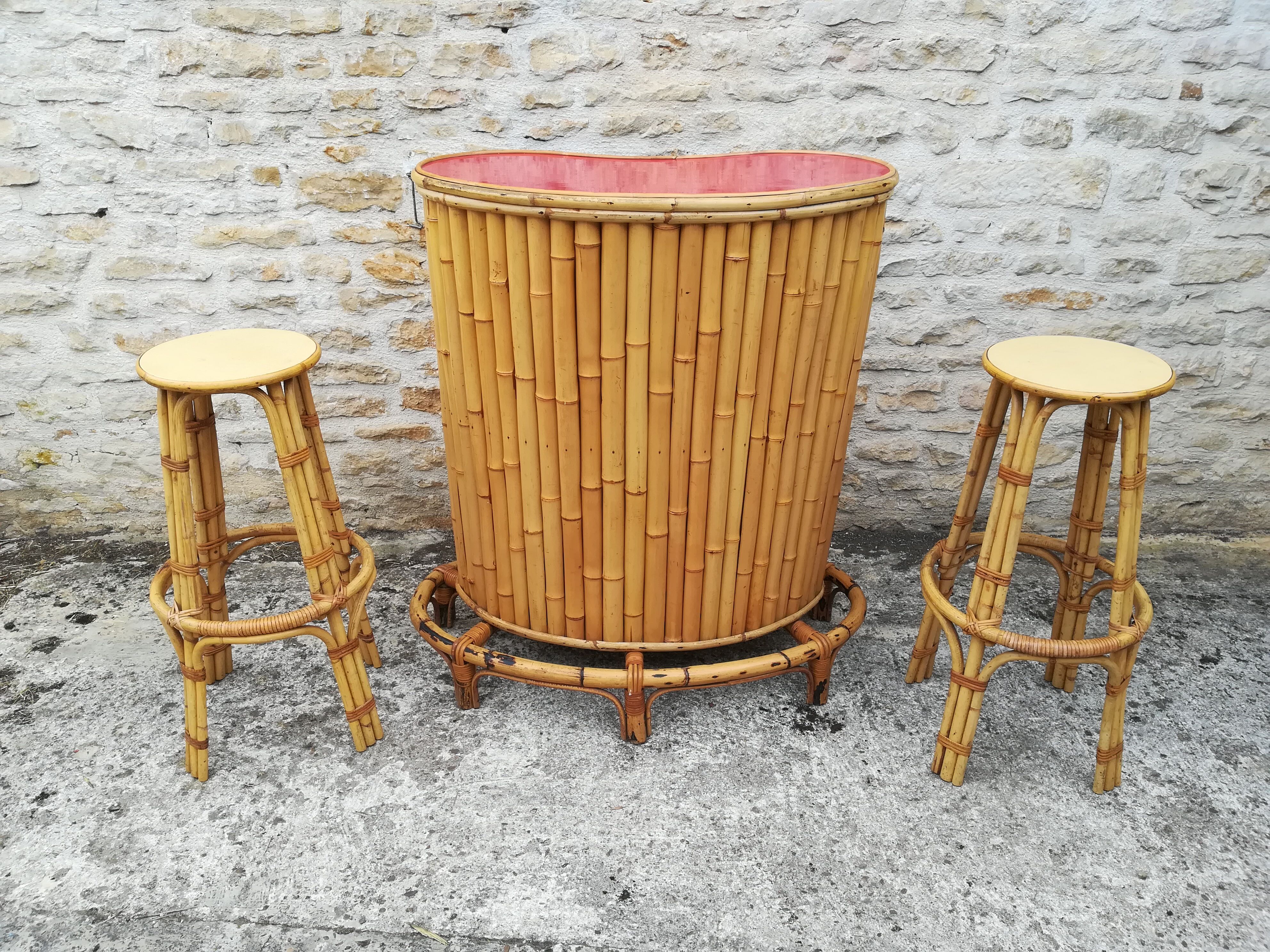 Bamboo tiki bar and two stools