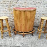 Bamboo tiki bar and two stools