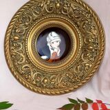 Brass wall decoration repelled hand-painted portrait