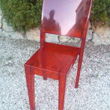 Orange design chair in polycarbonate plexiglass