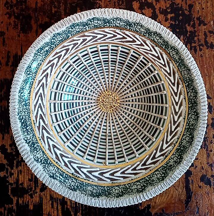 Earthenware fruit bowl - signed and numbered under the base