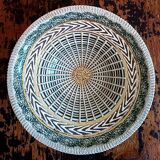 Earthenware fruit bowl - signed and numbered under the base