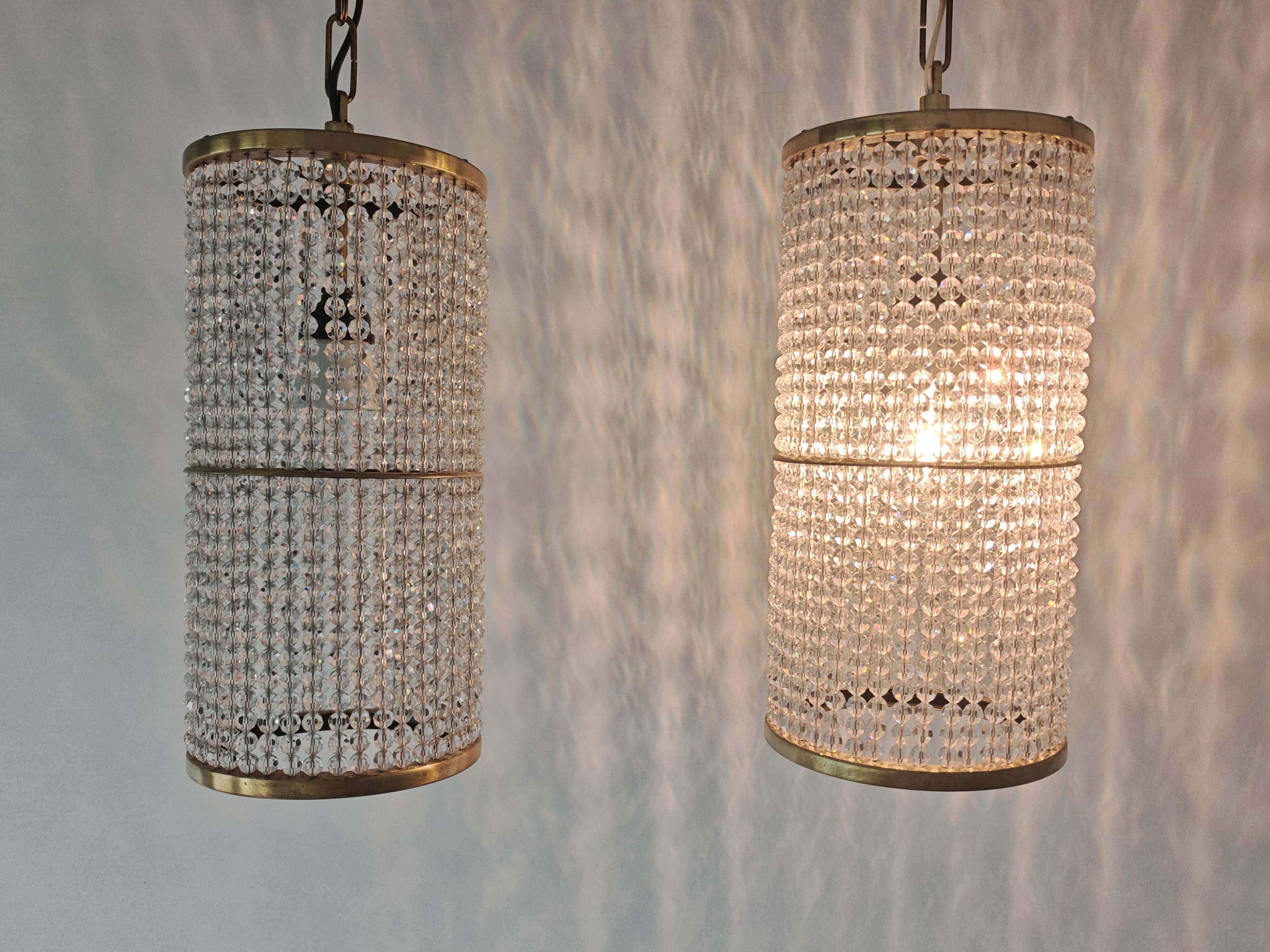 Set of 3 cylindrical crystal chandeliers in mid-century modern style attributed to Lobmeyr.
