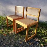 Pair of vintage varnished wood tanned chairs