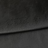 1980s cor armchair and ottoman in black leather