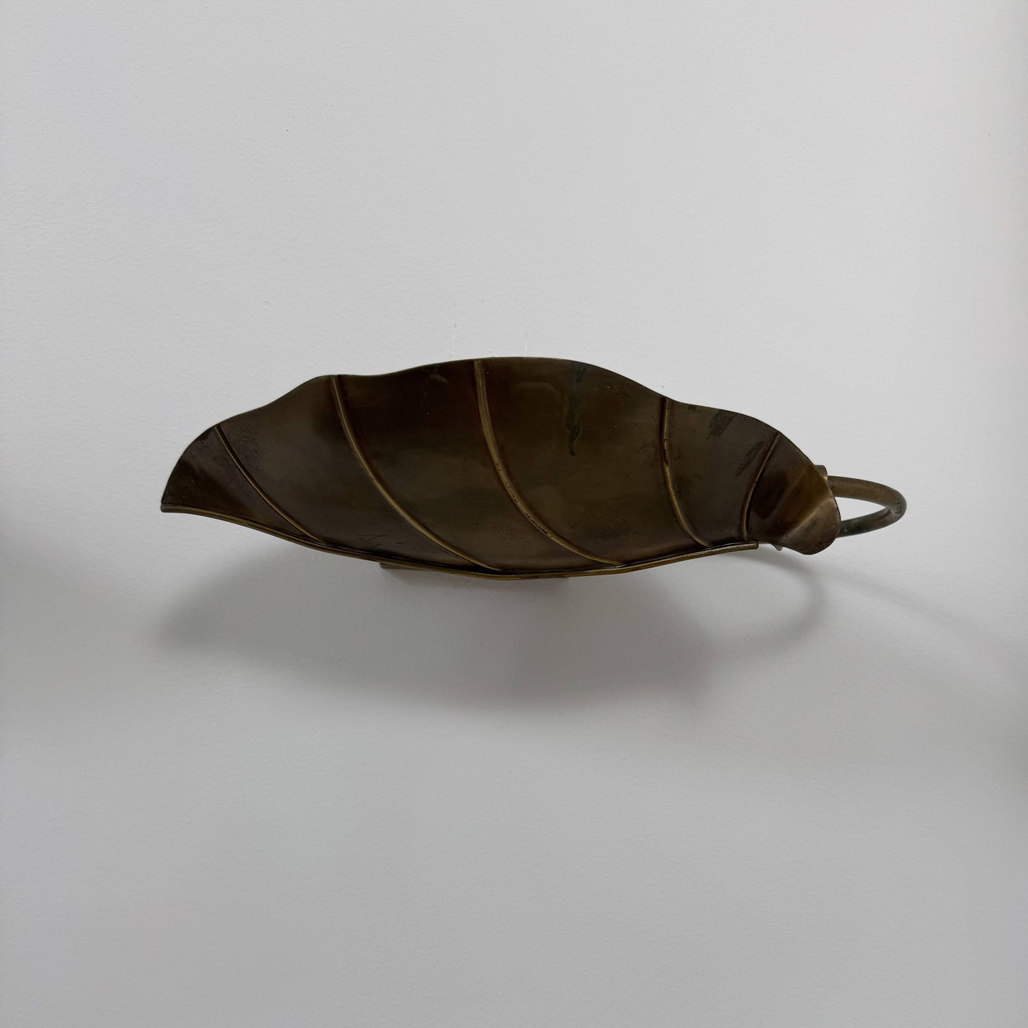 Pair of vintage wall lights, patinated brass, France, 1970.