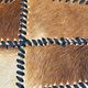 Tapis en patchwork de cuir de vache à lacets / années 1980