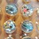 Vintage wooden solitaire game with resin balls and insects – Madaga