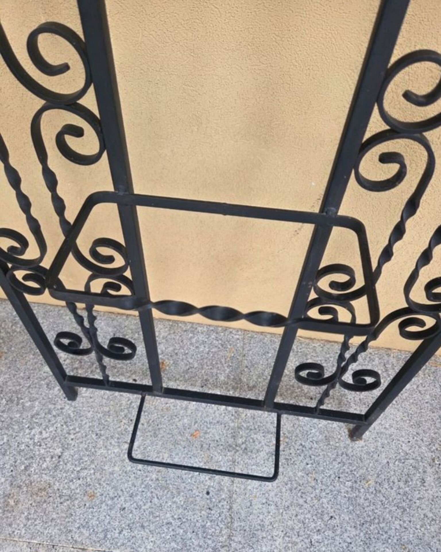 Large vintage wall coat rack in wrought iron with mirror and shelf.