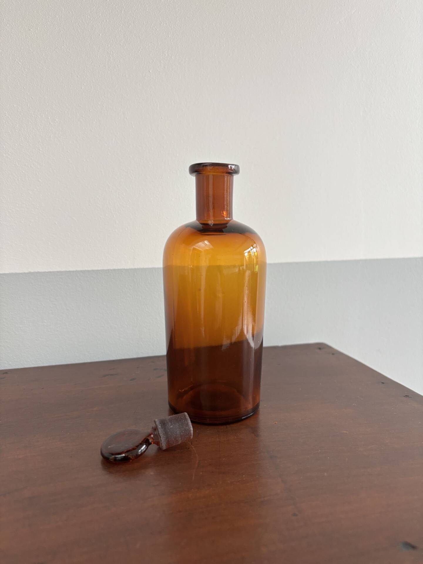 Small amber glass bottle