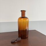 Small amber glass bottle