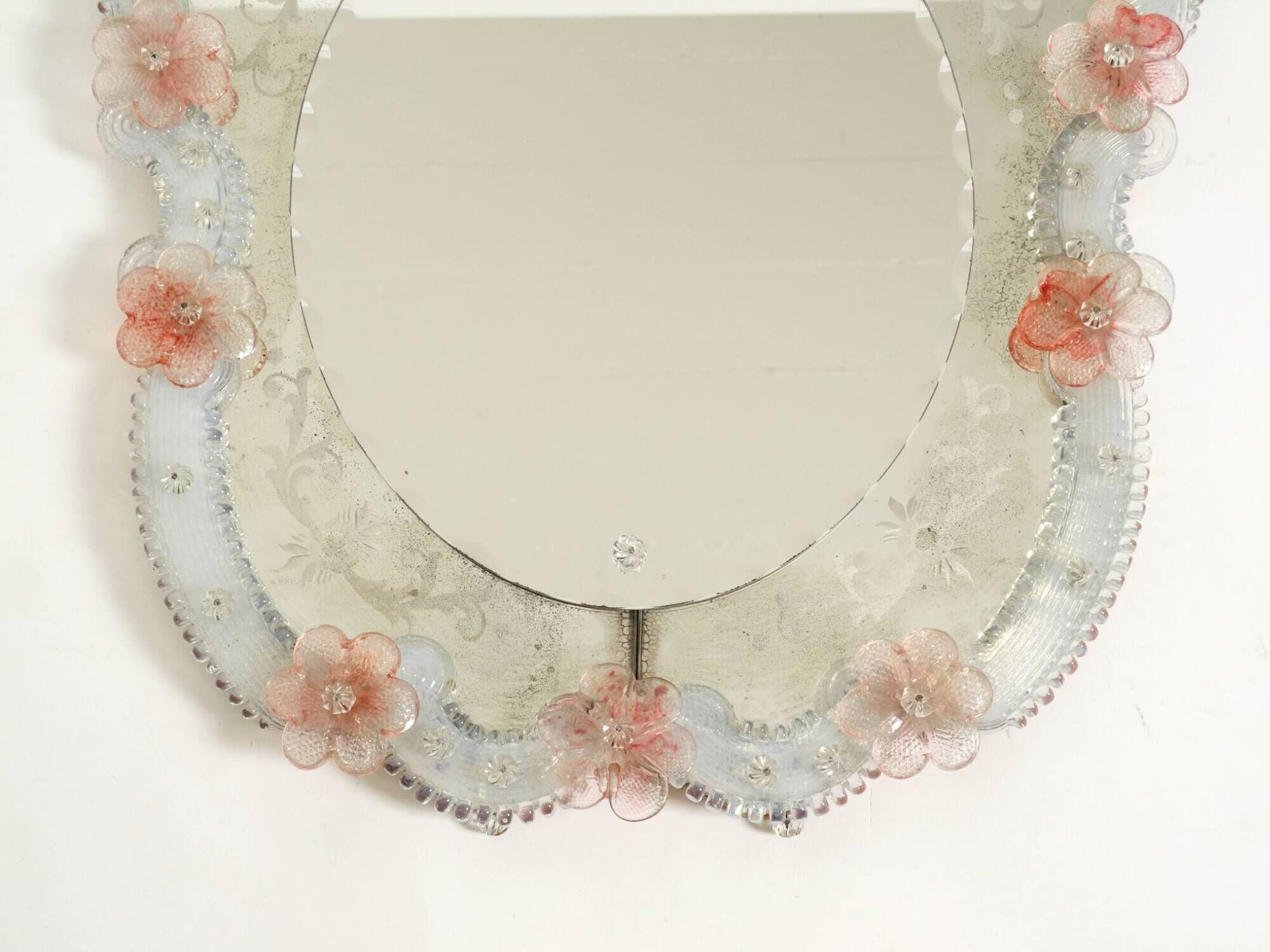 Italian mid-century wall mirror with a Murano glass frame and blossoms