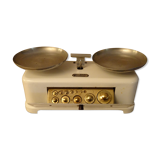 Old enamelled household scale forces 5 kg type roberval with its weights ref A212/1