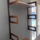 Modular metal wall shelf in brown and beige vintage 70s design.