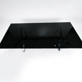 Smoked glass and chrome table design – Italian style from the 1970s.