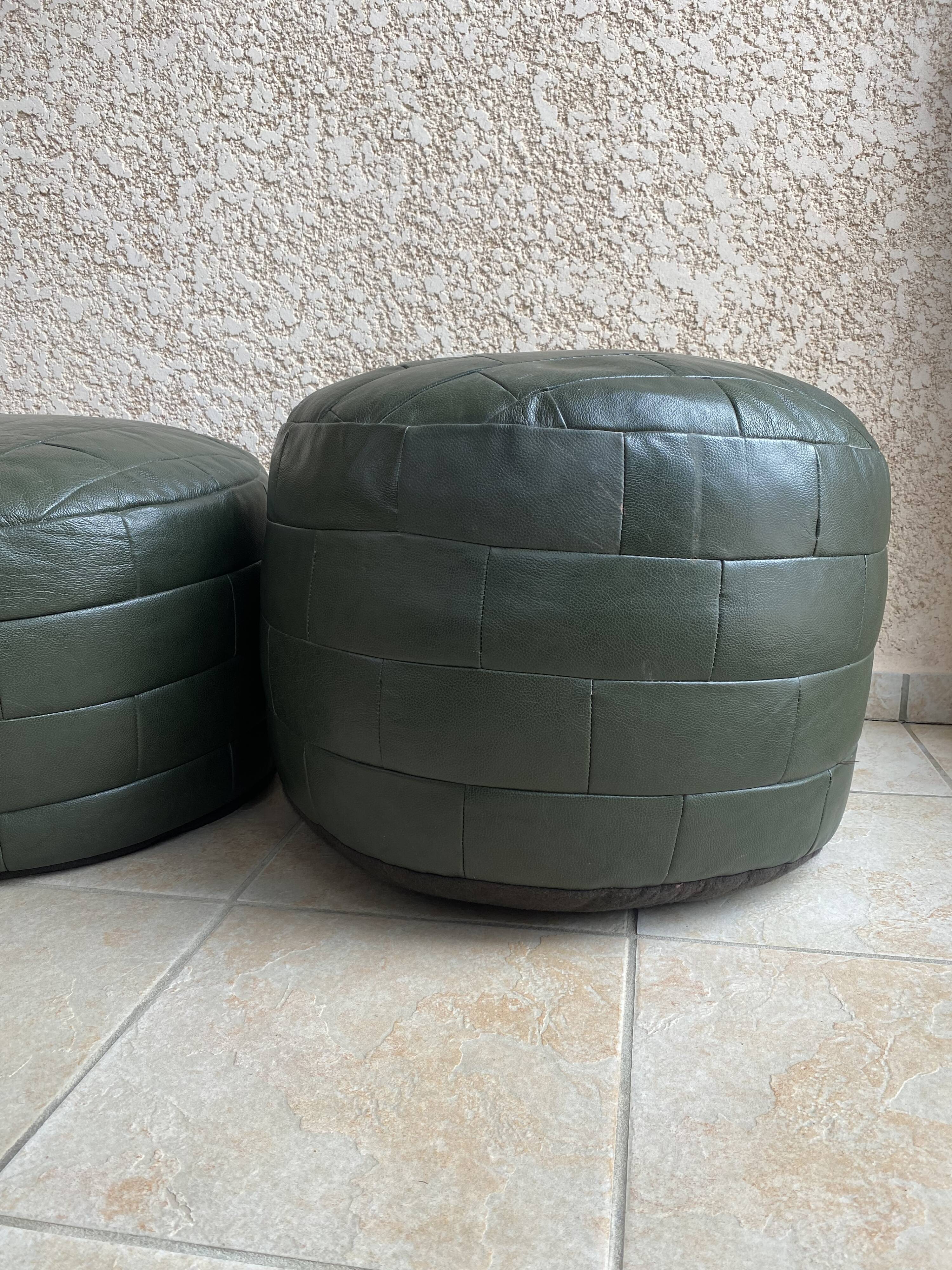 Two poufs or pieces of sofas in leather patchwork