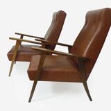 Pair of Scandinavian armchairs in brown leatherette and wood from the 50s and 60s