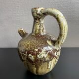 Ceramic pitcher signed Pegomas