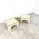 Pair of travertine and brass coffee tables, 1970s