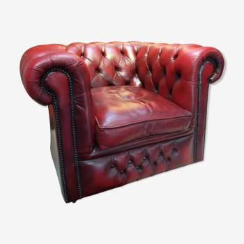 Classic oxblood red Chesterfield chair
