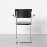 Tubax cantilever chair with black armrest