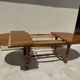 Oak dining table, oval living room table with two extensions.