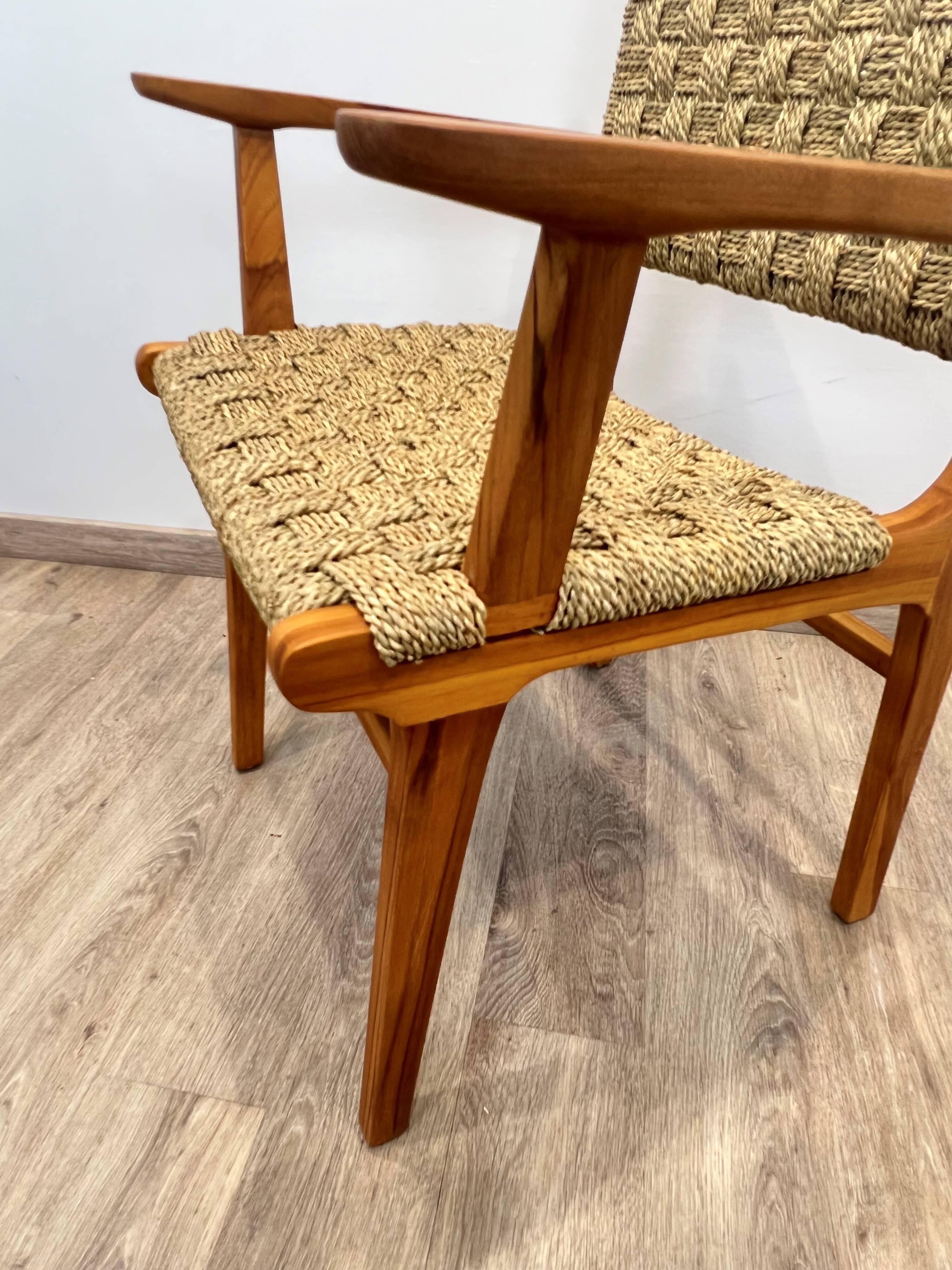Pair of woven teak armchairs