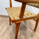 Pair of woven teak armchairs