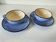 A pair of glazed ceramic cups and saucers from the 60s-70s.