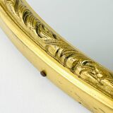 Vintage mirror in a brass frame, Italy, 1950s.