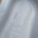 Antique bidet in enamelled sheet metal with wrought iron support