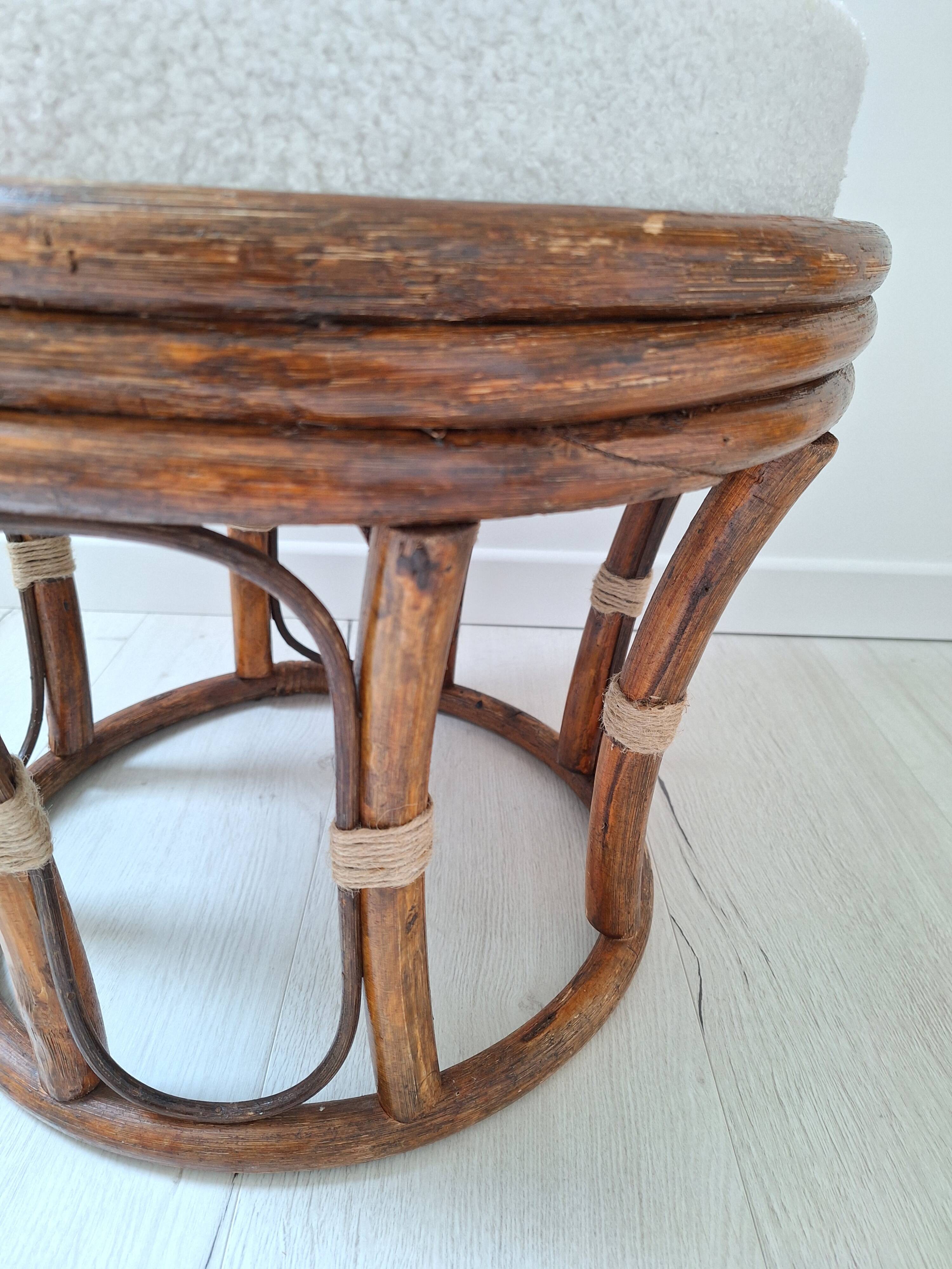 Rattan and boucle fabric pouf